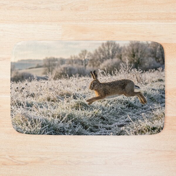 Item preview, Hare bounding across a frosty meadow designed and sold by Malisa345.