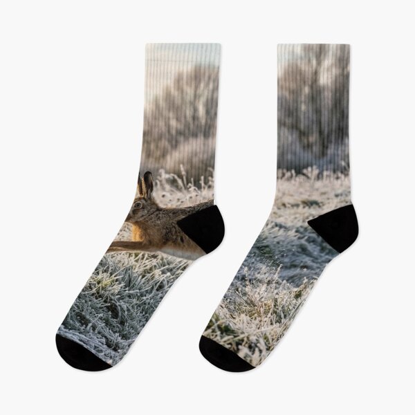 Item preview, Hare bounding across a frosty meadow designed and sold by Malisa345.