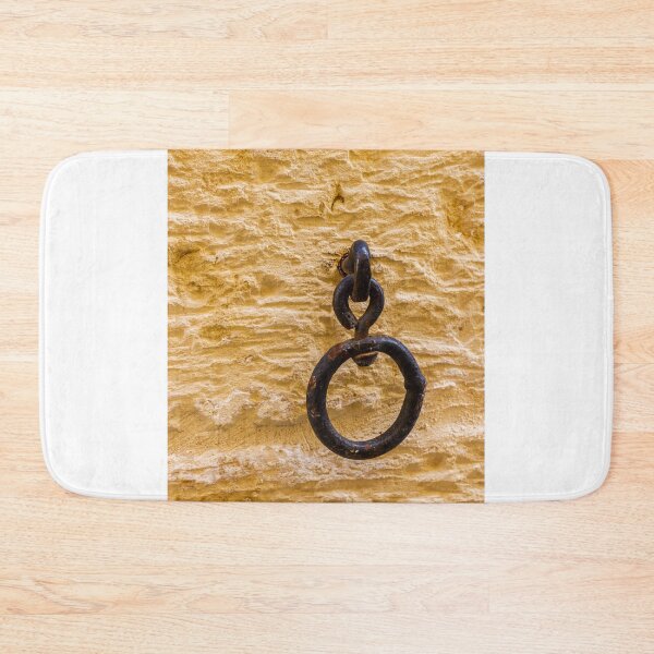 Item preview, Rusty Iron Ring Mounted On A Yellow Textured Wall Accent In Vintage Architectural Detail designed and sold by Nmallia.