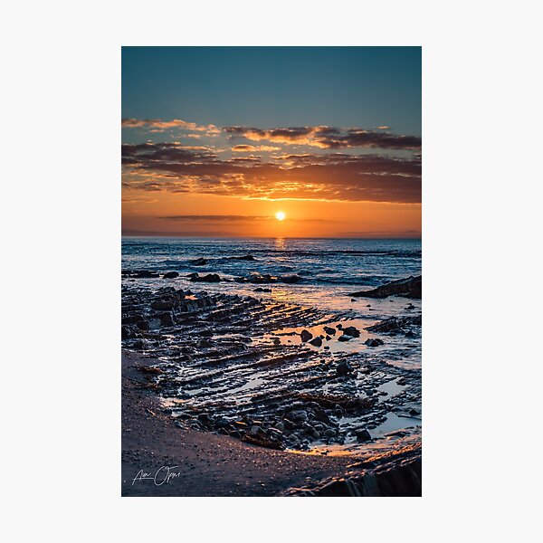 Sunrise over the ocean Photographic Print