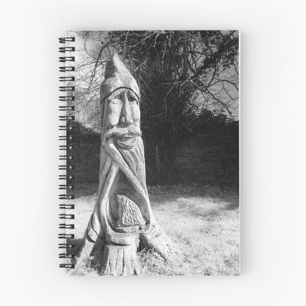 Item preview, Mystical Wood Spirit Tree Carving – Black and White Forest Sculpture Photography, Rustic Nature Art Print designed and sold by ivon55.