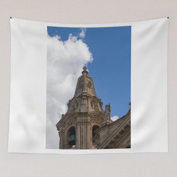 Item preview, Ornate Church Steeple and Bell Tower With Statue Against Blue Sky and Clouds designed and sold by Nmallia.