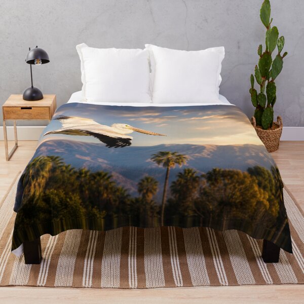 Item preview, Golden Flight Over Coastal Palms — Cinematic Pelican in Motion designed and sold by Kimberly Palmer.