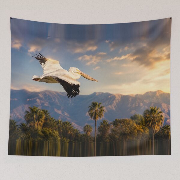 Item preview, Golden Flight Over Coastal Palms — Cinematic Pelican in Motion designed and sold by Kimberly Palmer.