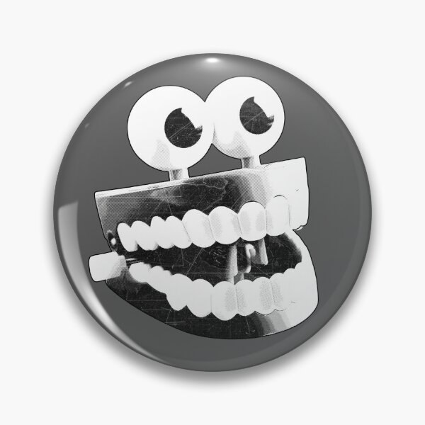 Aperçu de l'œuvre Jouet d'horreur à remontoir avec des dents qui claquent créée et vendue par Ghoul Enterprises.