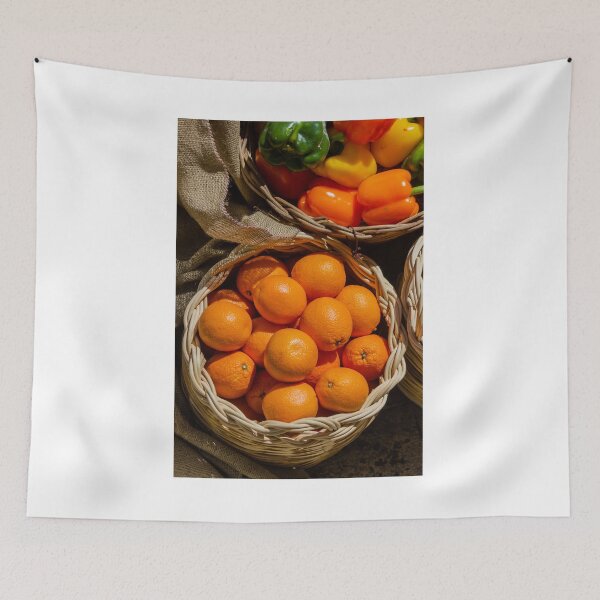 Item preview, Fresh Oranges in Wicker Basket at Market With Colorful Bell Peppers and Burlap designed and sold by Nmallia.
