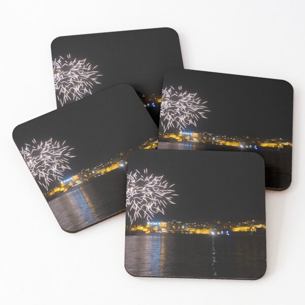 Item preview, Fireworks Over Coastal City At Night With Reflections On Calm Harbor Water And Illuminated Skyline designed and sold by Nmallia.