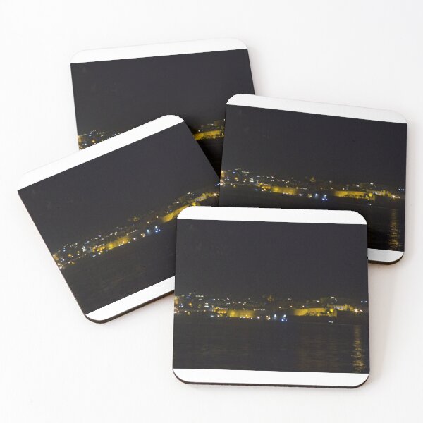 Item preview, Fireworks Over Coastal City At Night With Reflections On Calm Harbor Water And Illuminated Skyline designed and sold by Nmallia.