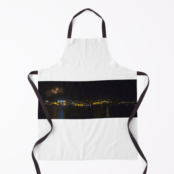 Item preview, Fireworks Over Coastal City At Night With Reflections On Calm Harbor Water And Illuminated Skyline designed and sold by Nmallia.