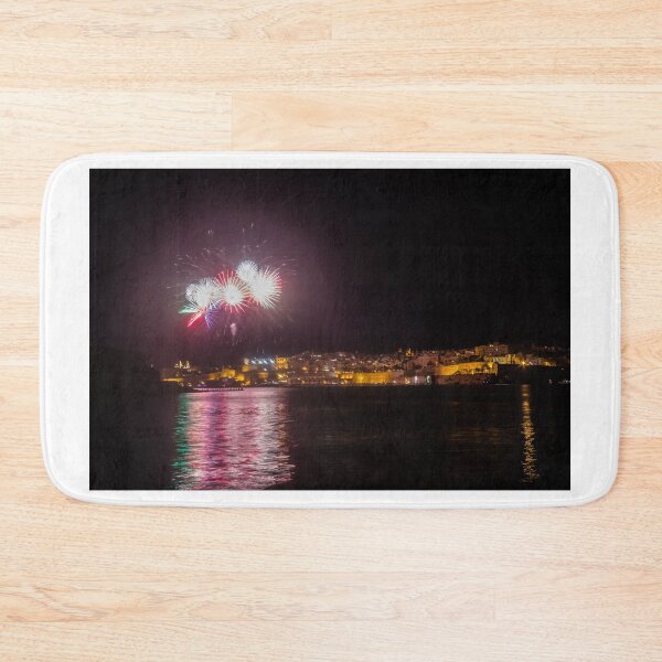Item preview, Night Fireworks Over Coastal City With Golden Lights And Water Reflection During Celebration designed and sold by Nmallia.