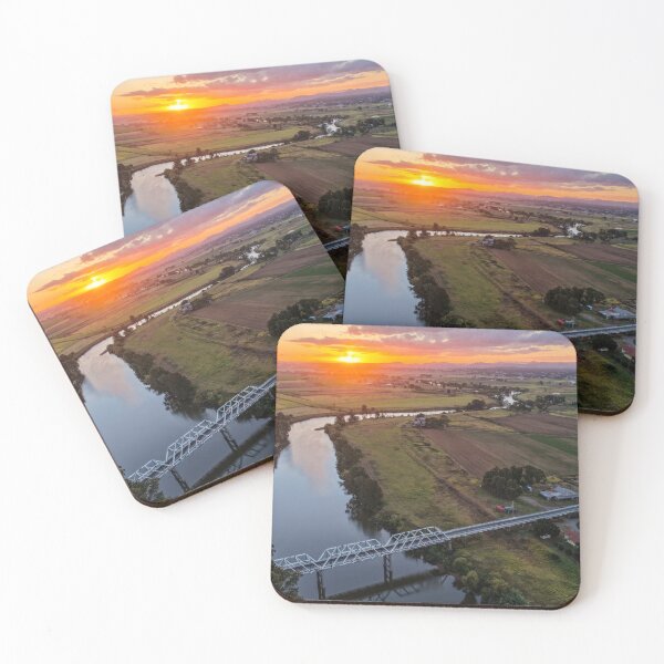 Item preview, Aerial view of a glowing sunset over rural farmland designed and sold by Justin Mckinney.
