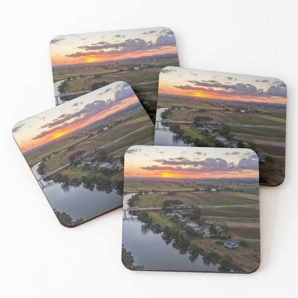 Item preview, Aerial view of a glowing sunset over rural farmland designed and sold by Justin Mckinney.