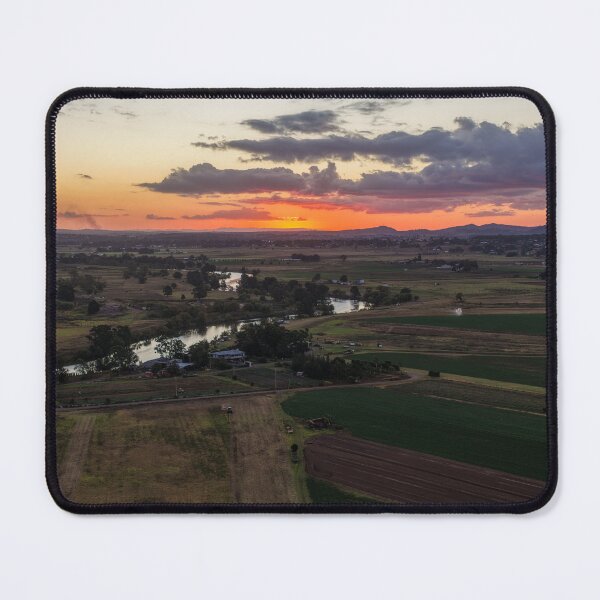 Item preview, Aerial view of a sunset over the river designed and sold by Justin Mckinney.