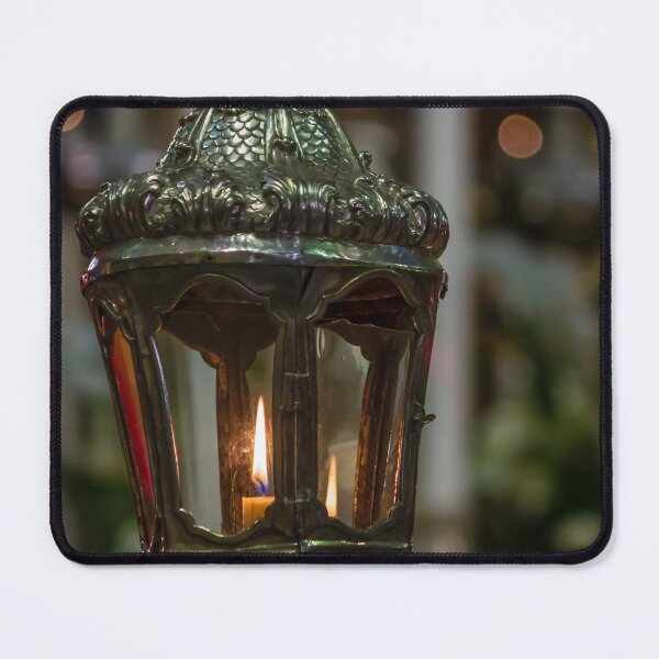 Item preview, Ornate Church Lantern With Lit Candle Flame Close-Up Showing Vintage Metalwork and Warm Glow designed and sold by Nmallia.