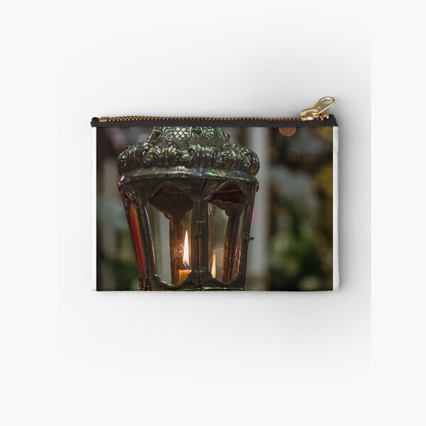 Item preview, Ornate Church Lantern With Lit Candle Flame Close-Up Showing Vintage Metalwork and Warm Glow designed and sold by Nmallia.