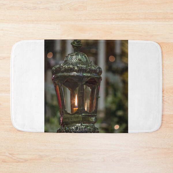 Item preview, Ornate Church Lantern With Lit Candle Flame Close-Up Showing Vintage Metalwork and Warm Glow designed and sold by Nmallia.