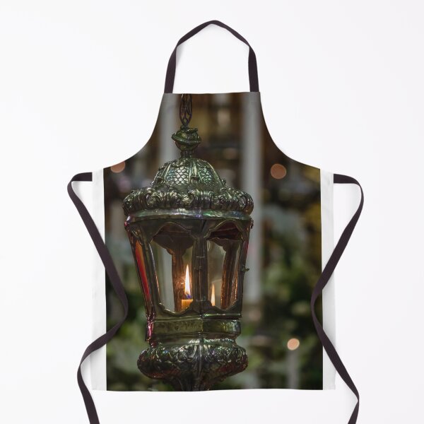 Item preview, Ornate Church Lantern With Lit Candle Flame Close-Up Showing Vintage Metalwork and Warm Glow designed and sold by Nmallia.