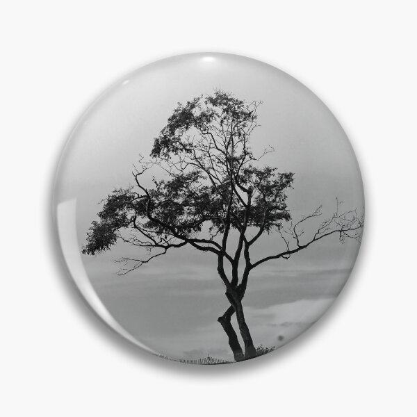 Item preview, The Lone Storyteller: Wind-Swept Tree in Monochrome designed and sold by sky earth human.