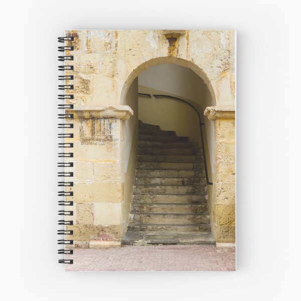 Item preview, Old Stone Staircase Through Arched Entrance In Historic Building With Weathered Texture designed and sold by Nmallia.