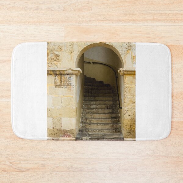 Item preview, Old Stone Staircase Through Arched Entrance In Historic Building With Weathered Texture designed and sold by Nmallia.