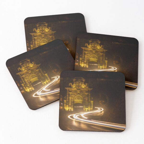 Item preview, Long Exposure Light Trails Curving Past a Historic Stone Gate and Archway at Night designed and sold by Nmallia.