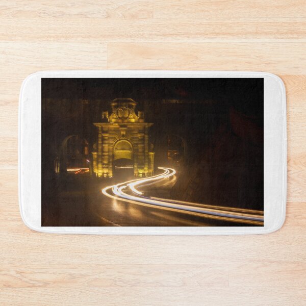 Item preview, Long Exposure Light Trails Curving Past a Historic Stone Gate and Archway at Night designed and sold by Nmallia.