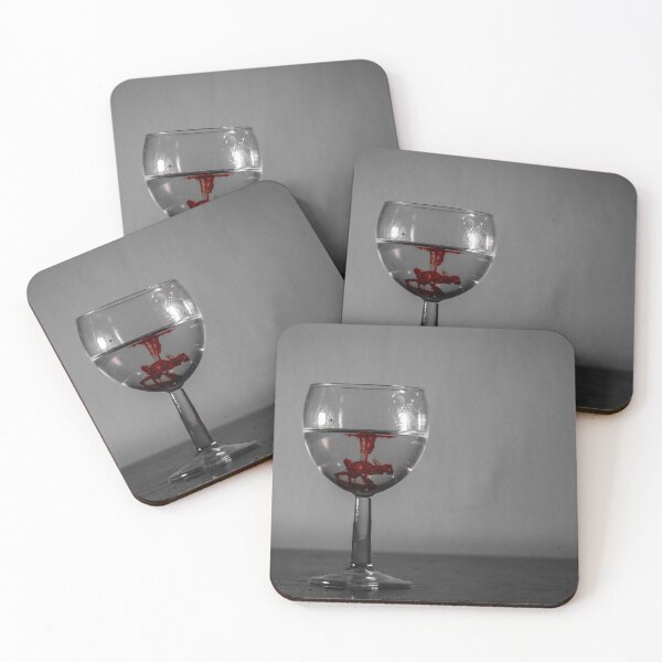 Item preview, Red Ink Droplet In Wine Glass Of Water With Monochrome Background And Dramatic Contrast designed and sold by Nmallia.