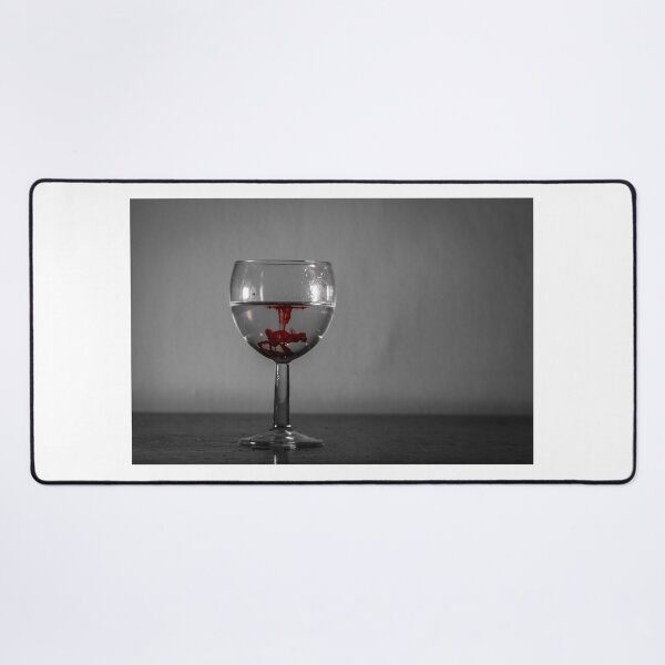 Item preview, Red Ink Droplet In Wine Glass Of Water With Monochrome Background And Dramatic Contrast designed and sold by Nmallia.
