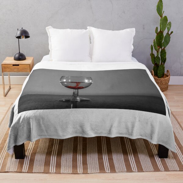Item preview, Red Ink Droplet In Wine Glass Of Water With Monochrome Background And Dramatic Contrast designed and sold by Nmallia.