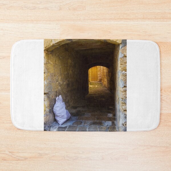 Item preview, Narrow Stone Alleyway With Arched Passage and Yellow Doorway Evoking Mystery and Solitude designed and sold by Nmallia.