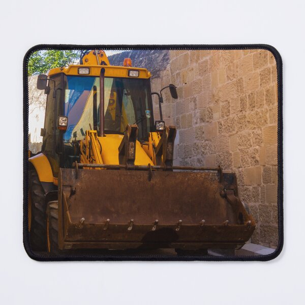 Item preview, Backhoe Loader Parked In Narrow Alley Between Old Stone Walls On Urban Construction Site designed and sold by Nmallia.