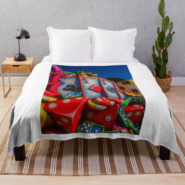 Item preview, Colorful Carnival Float Featuring Giant Playing Cards, Dice and Poker Chips Against Blue Sky designed and sold by Nmallia.