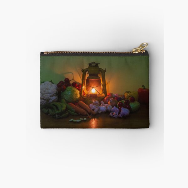 Item preview, Rustic Lantern and Fresh Vegetables Still Life on a Wooden Table With Warm Candlelight Glow designed and sold by Nmallia.