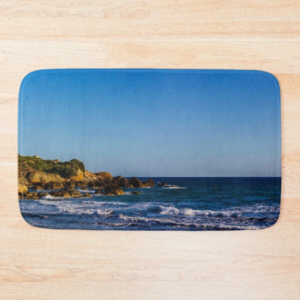 Item preview, Panoramic Rocky Beach and Cliff Coastline With Blue Sea Waves Under Clear Sunny Sky designed and sold by Nmallia.