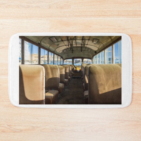 Item preview, Abandoned School Bus Interior With Empty Sunlit Seats and Worn Vintage Upholstery Evoking Nostalgia designed and sold by Nmallia.