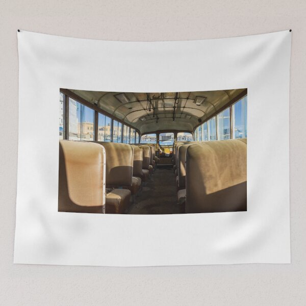 Item preview, Abandoned School Bus Interior With Empty Sunlit Seats and Worn Vintage Upholstery Evoking Nostalgia designed and sold by Nmallia.