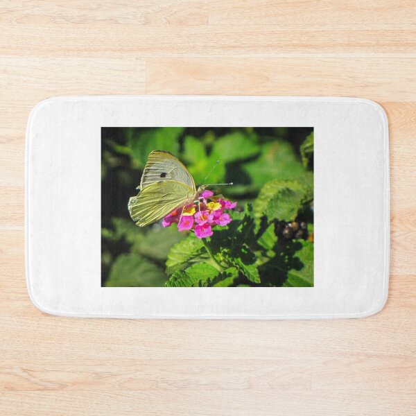 Item preview, Yellow Butterfly Feeding On Pink Wildflower In Lush Green Garden Macro Close-Up designed and sold by Nmallia.