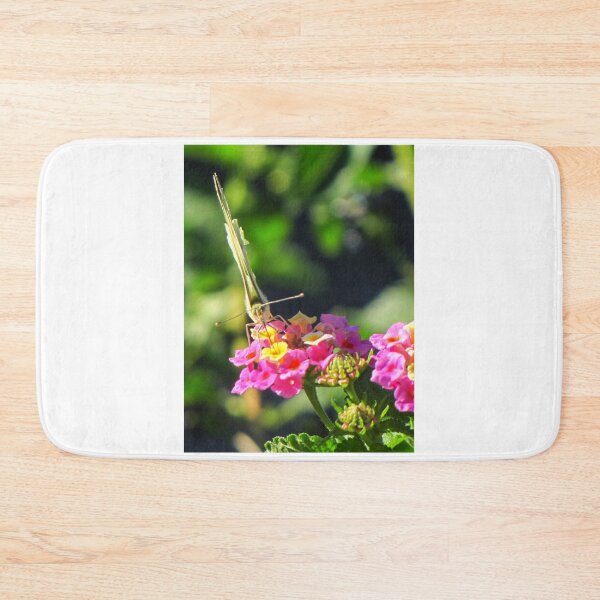 Item preview, Yellow Butterfly Feeding On Pink Wildflower In Lush Green Garden Macro Close-Up designed and sold by Nmallia.