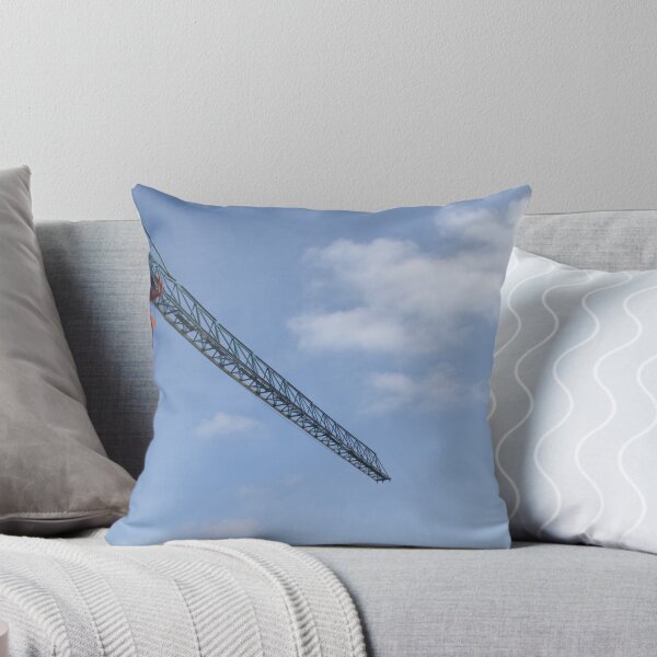 Item preview, Construction crane detail against a clear blue sky with white clouds. designed and sold by FlorinWorks.