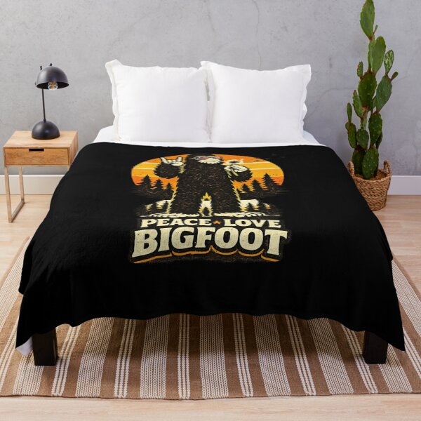 Item preview, Bigfoot Blowing Dandelion Peace Love Bigfoot Retro Vintage Sasquatch Funny Bigfoot Shirt designed and sold by VibeOffline Studio.