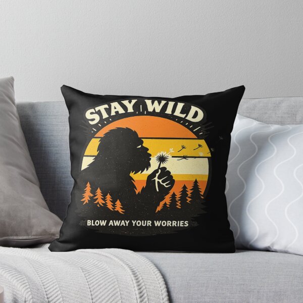 Item preview, Stay Wild Blow Away Your Worries Bigfoot Retro Vintage Shirt, Bigfoot Blowing Dandelion designed and sold by VibeOffline Studio.