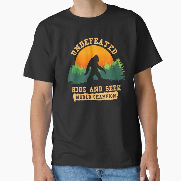 Item preview, Undefeated Hide and Seek World Champion T shirt Bigfoot T shirt designed and sold by ChillingNation.