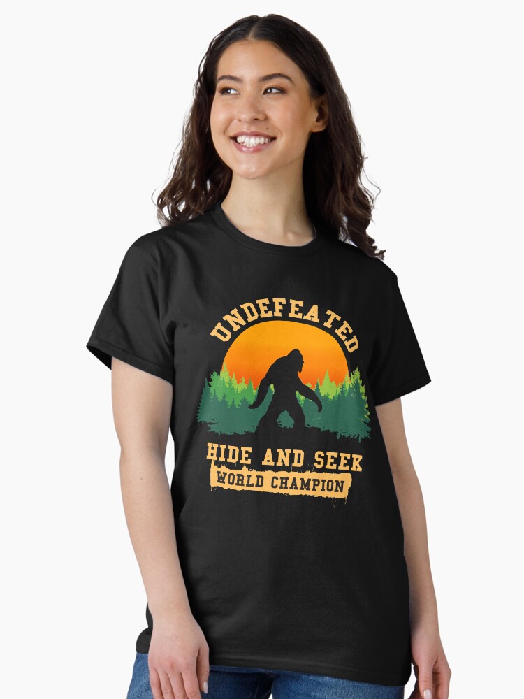 Thumbnail 2 of 7, Classic T-Shirt, Undefeated Hide and Seek World Champion T shirt Bigfoot T shirt designed and sold by ChillingNation.