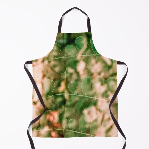 Item preview, A delicate multiple exposure of small, rounded green leaves layered over warm, peach-toned foliage. designed and sold by AbulailArt.
