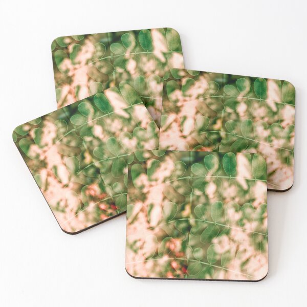 Item preview, A delicate multiple exposure of small, rounded green leaves layered over warm, peach-toned foliage. designed and sold by AbulailArt.