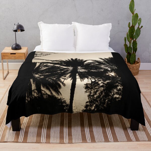 Item preview, Silhouette of Palm Trees Against a Soft Sunset Sky in the United Arab Emirates designed and sold by AbulailArt.