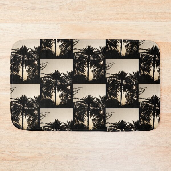 Item preview, Silhouette of Palm Trees Against a Soft Sunset Sky in the United Arab Emirates designed and sold by AbulailArt.