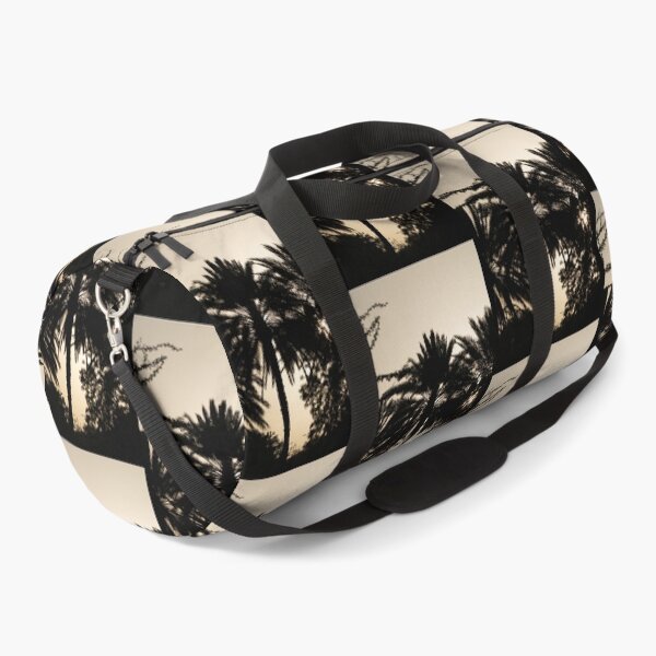 Item preview, Silhouette of Palm Trees Against a Soft Sunset Sky in the United Arab Emirates designed and sold by AbulailArt.