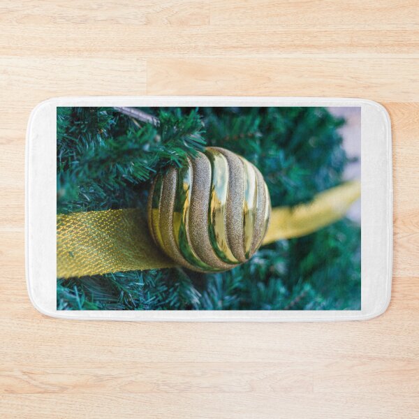 Item preview, Gold Christmas Ornament With Ribbon on Green Tree Closeup Holiday Decoration designed and sold by Nmallia.