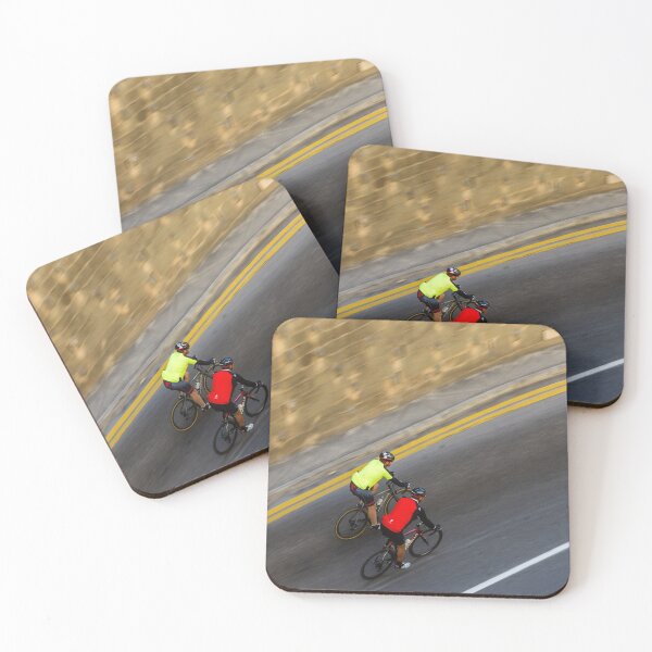 Item preview, Two Road Cyclists Riding Together Along Curved Urban Street in Motion designed and sold by Nmallia.